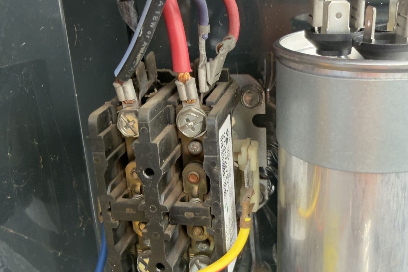 Contactor and capacitor repair inside an AC unit